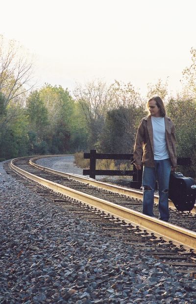 Matthew Hope Standing on Rails