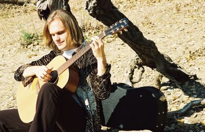 Matthew Hope Playing on a Rock